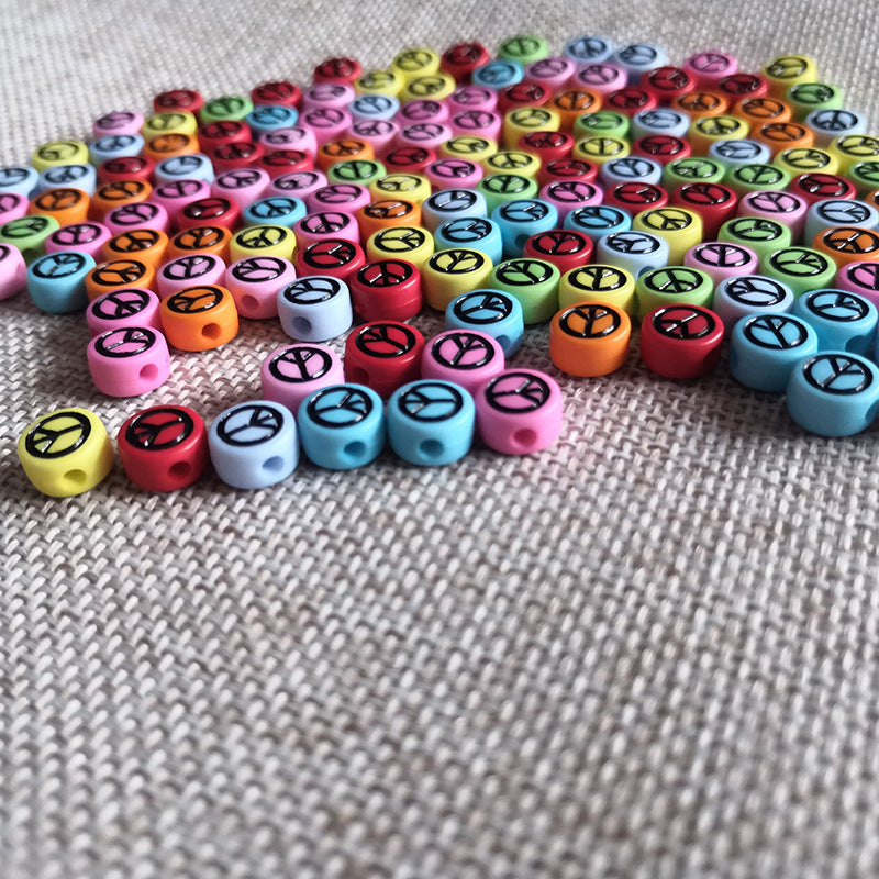 100pcs/paquete al por mayor 4*7 mm acrílico colorido de signo de paz cuentas